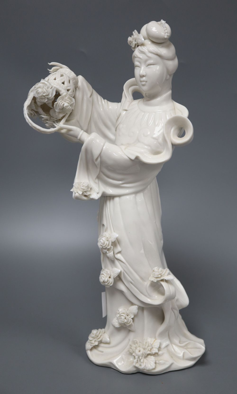 A blanc de chine figure of Kwan Yin (minor faults), H.37cm